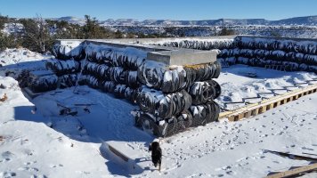 tire bale house in snow.jpg